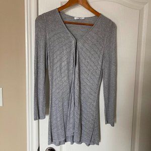 Rick's light grey crochet knit sweater